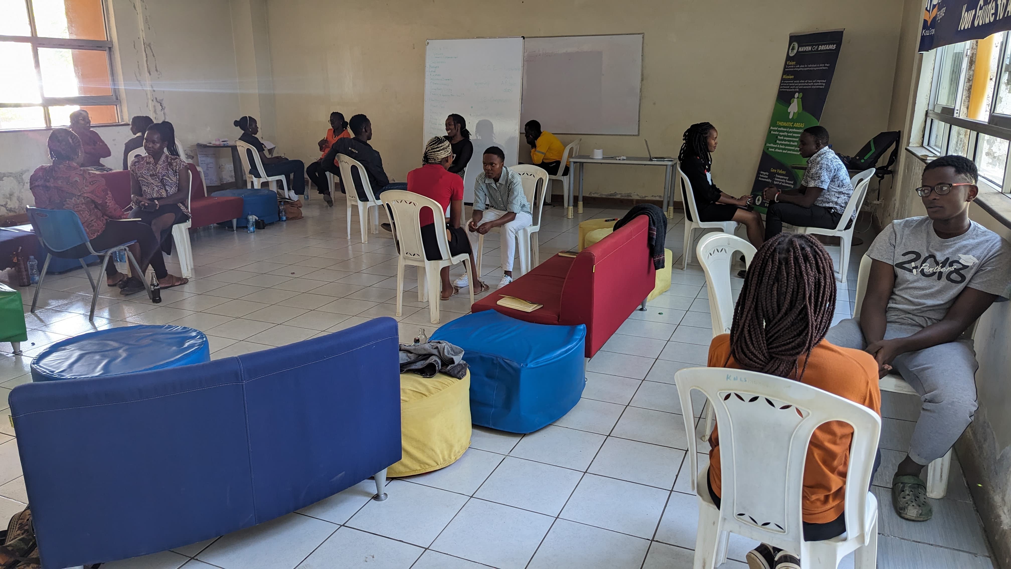 Young people attend a community session on health knowledge management and comprehensive sexuality education organized by Haven of Dreams. Photo: Haven of Dreams. 